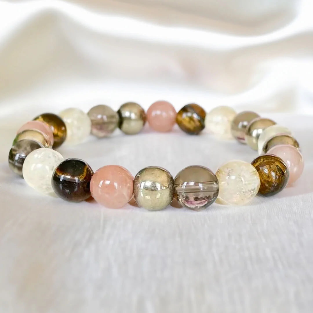 Bracelet "Solaris" en Quartz Rutile Doré, Pyrite, Oeil de Tigre, Pierre de Soleil, Quartz Fumé